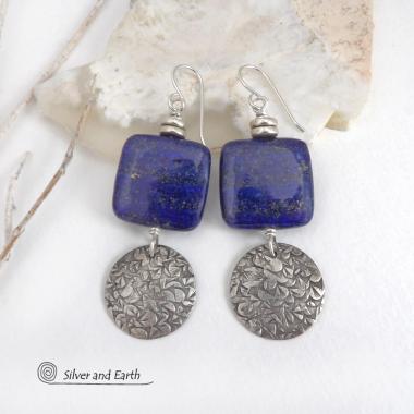 These earrings feature natural lapis lazuli gemstones accented with textured sterling silver dangles. The stones have a beautiful deep blue hue with natural pyrite inclusions. They are topped off with tiny pewter beads. The design is modern, classic, elegant and always in style. They'll coordinate beautifully with all wardrobe types. Handmade in the USA by Silver and Earth Jewelry. 