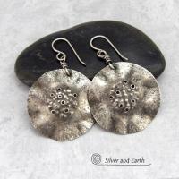 These handcrafted solid sterling silver earrings have a modern, organic earthy style with an edgy vibe. Perfect for everyday wear - they go with everything. They feature large round sterling silver dangles with a bumpy hammered texture and a rustic oxidized satin finish. 