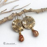 These handcrafted gold brass earrings have a modern, organic earthy style and are accented with natural brown spotted jasper gemstones. Bold, unique and one-of-a-kind - they make a striking statement with a modern edgy vibe. Perfect for women that love unique artisan handcrafted jewelry, earthy hammered textures and natural stones. Handmade in the USA by Silver and Earth Jewelry.