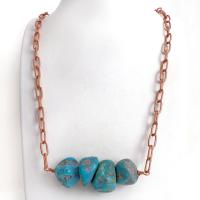This chunky turquoise necklace features big, organically-shaped nuggets of genuine natural turquoise accented with a copper link chain. The turquoise is a stunning shade of blue - reminiscent of the lovely blue skies here in the American Southwest. Unique and one-of-a-kind, it will make a bold statement. Perfect for women that love bold unique jewelry made with natural stones. Handmade in the USA by Silver and Earth Jewelry. 