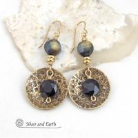 These handcrafted earrings feature gold brass dangles with a hand stamped texture accented with black onyx and golden-black tiger's eye gemstones and tiny gold brass beads. The stones have a faceted cut which casts off a beautiful natural sparkle and shine. They have a modern, elegant boho chic style that looks great dressed up or down.