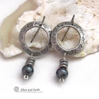 These silver pewter hoop earrings have a hand stamped texture and are accented with hematite gemstones and stainless steel beads. The stones have a metallic gray hue which cast offs a bit of natural shimmer & shine. They have a modern chic style that coordinates beautifully with all wardrobe styles. Earrings are lightweight and comfortable to wear. Handmade in the USA by Silver and Earth Jewelry. 