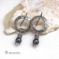 These silver pewter hoop earrings have a hand stamped texture and are accented with hematite gemstones and stainless steel beads. The stones have a metallic gray hue which cast offs a bit of natural shimmer & shine. They have a modern chic style that coordinates beautifully with all wardrobe styles. Earrings are lightweight and comfortable to wear. Handmade in the USA by Silver and Earth Jewelry. 