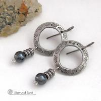 These silver pewter hoop earrings have a hand stamped texture and are accented with hematite gemstones and stainless steel beads. The stones have a metallic gray hue which cast offs a bit of natural shimmer & shine. They have a modern chic style that coordinates beautifully with all wardrobe styles. Earrings are lightweight and comfortable to wear. Handmade in the USA by Silver and Earth Jewelry. 