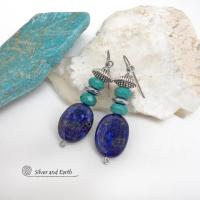 These handcrafted earrings feature natural lapis lazuli oval shaped gemstones accented with faceted turquoise and faceted hematite gemstones and textured silver pewter beads. Full of sundance style and southwestern charm, they'll coordinate well with all wardrobe types. Handmade in the USA by Silver and Earth Jewelry - a Certified New Mexico True business.