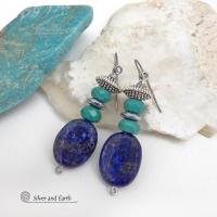 These handcrafted earrings feature natural lapis lazuli oval shaped gemstones accented with faceted turquoise and faceted hematite gemstones and textured silver pewter beads. Full of sundance style and southwestern charm, they'll coordinate well with all wardrobe types. Handmade in the USA by Silver and Earth Jewelry - a Certified New Mexico True business.