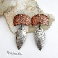 These handcrafted sterling silver and copper mixed metal earrings have an earthy, organic style with a modern tribal vibe. Unique and versatile, the combination of metals enables them to mix and match with other copper and silver accessories in your wardrobe. Handmade in the USA by Silver and Earth Jewelry.