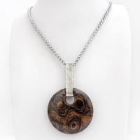 This one-of-a-kind necklace features a natural stromatolite fossil stone accented with a hand forged sterling silver bail with a lightly hammered organic texture. Stromatolites are fossilized layered deposits of algae within ancient sedimentary rock. These old single-celled organisms are believed to be some of the first forms of life on this planet.