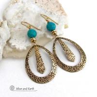 These handcrafted gold brass hoop earrings have a hand stamped texture and are accented with beautiful genuine turquoise gemstones with a faceted finish and small brass beads. They have an exotic boho chic design with an Egyptian inspired vibe and flair. Suitable for any occasion - they'll look great dressed up or down. Perfect for women that love to wear artisan handcrafted jewelry that makes a bold statement. Earrings are lightweight and comfortable to wear. Handmade in the USA by Silver and Earth Jewelry