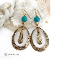 These handcrafted gold brass hoop earrings have a hand stamped texture and are accented with beautiful genuine turquoise gemstones with a faceted finish and small brass beads. They have an exotic boho chic design with an Egyptian inspired vibe and flair. Suitable for any occasion - they'll look great dressed up or down. Perfect for women that love to wear artisan handcrafted jewelry that makes a bold statement. Earrings are lightweight and comfortable to wear. Handmade in the USA by Silver and Earth Jewelry