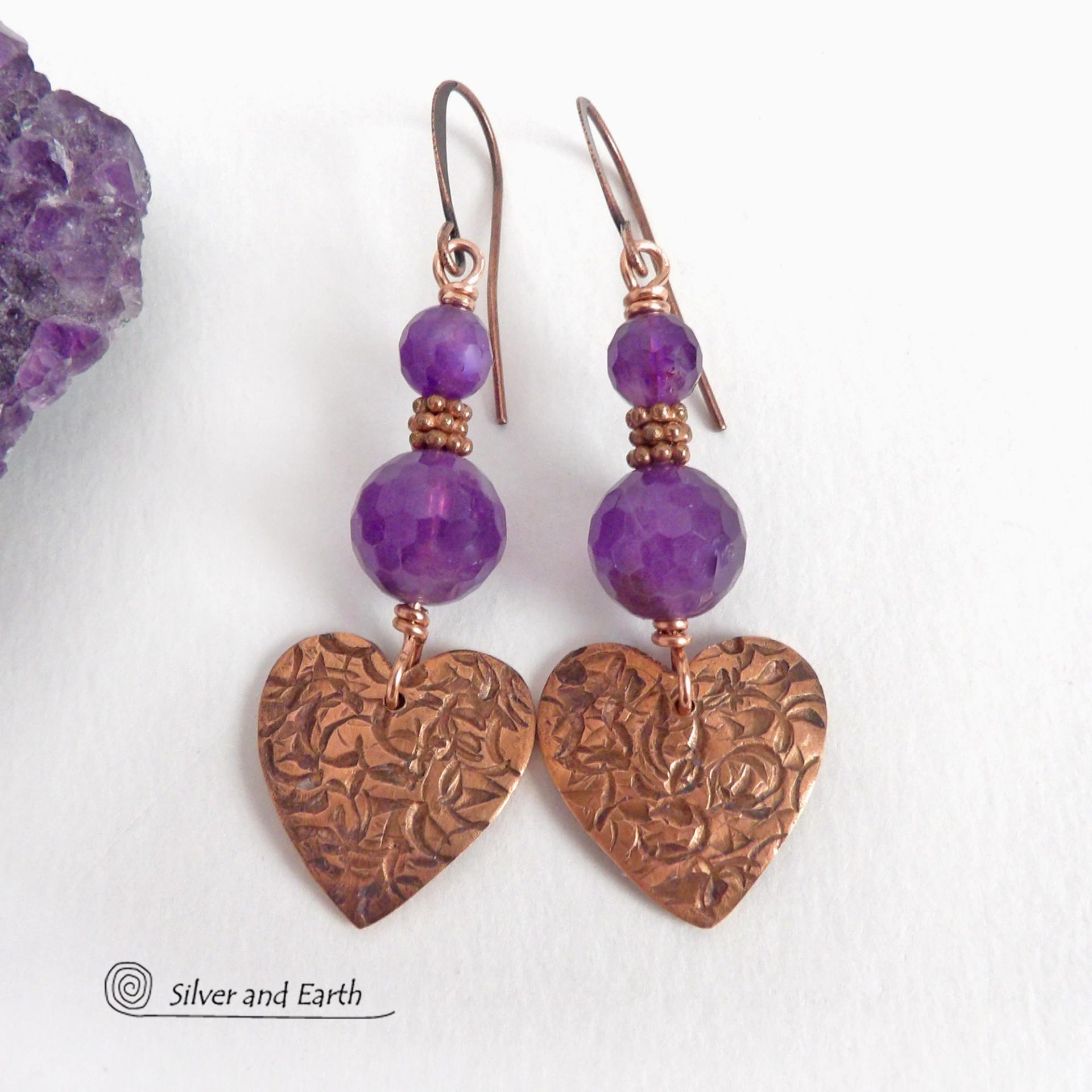 These handcrafted copper heart dangle earrings have a hand stamped texture and are accented with genuine purple amethyst gemstones with a faceted finish and tiny copper beads. Modern, classic and elegant - the style is always in fashion. The perfect gift for someone special on Valentine's Day or any day! They'll also make a great gift for someone with a February birthday or 6th anniversary - amethyst is the gemstone for either occasion. Or a 7th anniversary gift - copper is the traditional theme for this. 