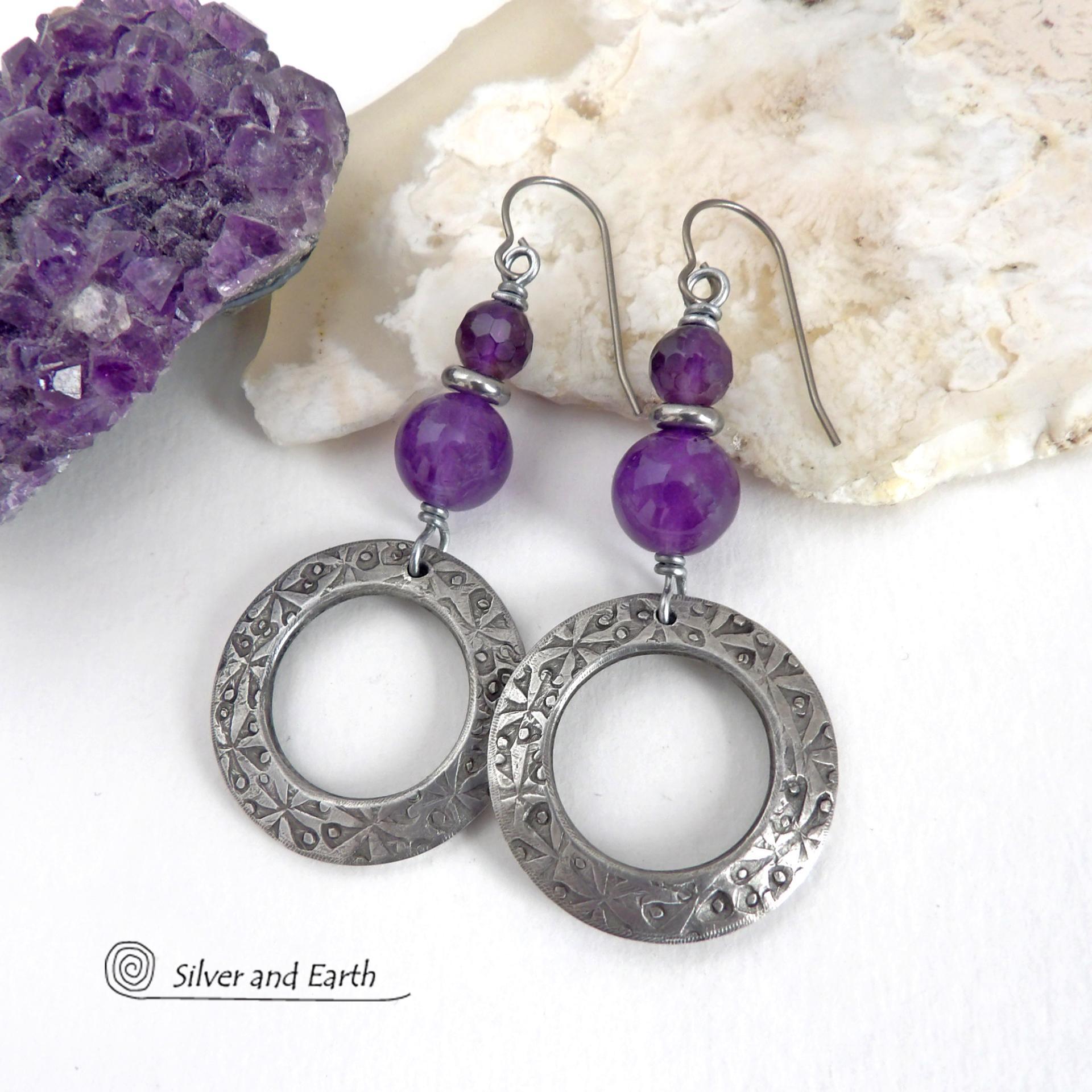 These handcrafted silver pewter hoop earrings have a hand stamped texture and are accented with a stack of purple amethyst gemstones and tiny stainless steel spacer beads. They have a modern, elegant chic style that will look great with all wardrobe styles - dressed up or down. Makes a great gift for someone with a February birthday - amethyst is that month's birthstone. Handmade in the USA by Silver and Earth Jewelry.
