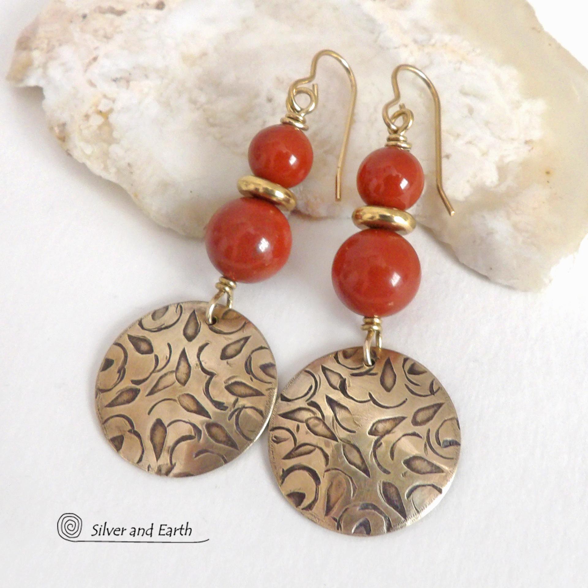These handcrafted earrings have an elegant, modern chic style that coordinates beautifully with all wardrobe types -- dressed up or down. They feature gold brass dangles with a hand stamped texture accented with a stack of red jasper gemstones and shiny brass beads. They'll make a great gift for a natural gemstone lover - or a nice addition to your own jewelry wardrobe. Handmade in the USA by Silver and Earth jewelry.