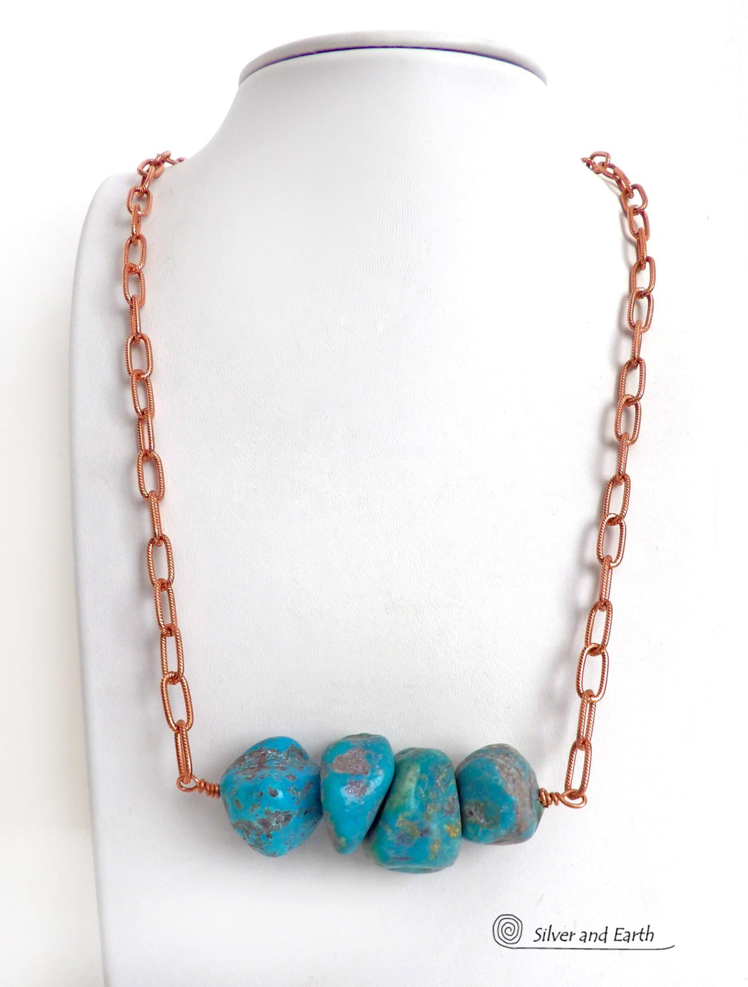 This chunky turquoise necklace features big, organically-shaped nuggets of genuine natural turquoise accented with a copper link chain. The turquoise is a stunning shade of blue - reminiscent of the lovely blue skies here in the American Southwest. Unique and one-of-a-kind, it will make a bold statement. Perfect for women that love bold unique jewelry made with natural stones. Handmade in the USA by Silver and Earth Jewelry. 