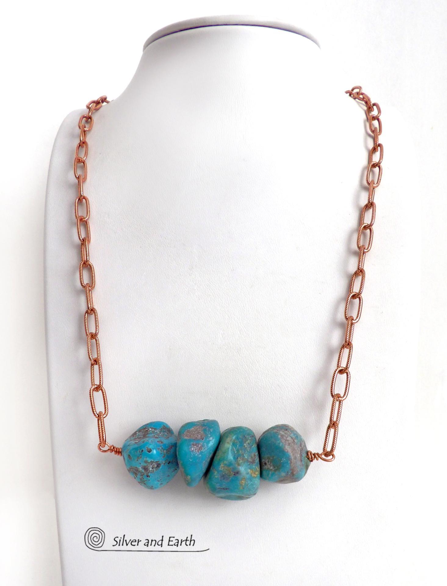 This chunky turquoise necklace features big, organically-shaped nuggets of genuine natural turquoise accented with a copper link chain. The turquoise is a stunning shade of blue - reminiscent of the lovely blue skies here in the American Southwest. Unique and one-of-a-kind, it will make a bold statement. Perfect for women that love bold unique jewelry made with natural stones. Handmade in the USA by Silver and Earth Jewelry. 