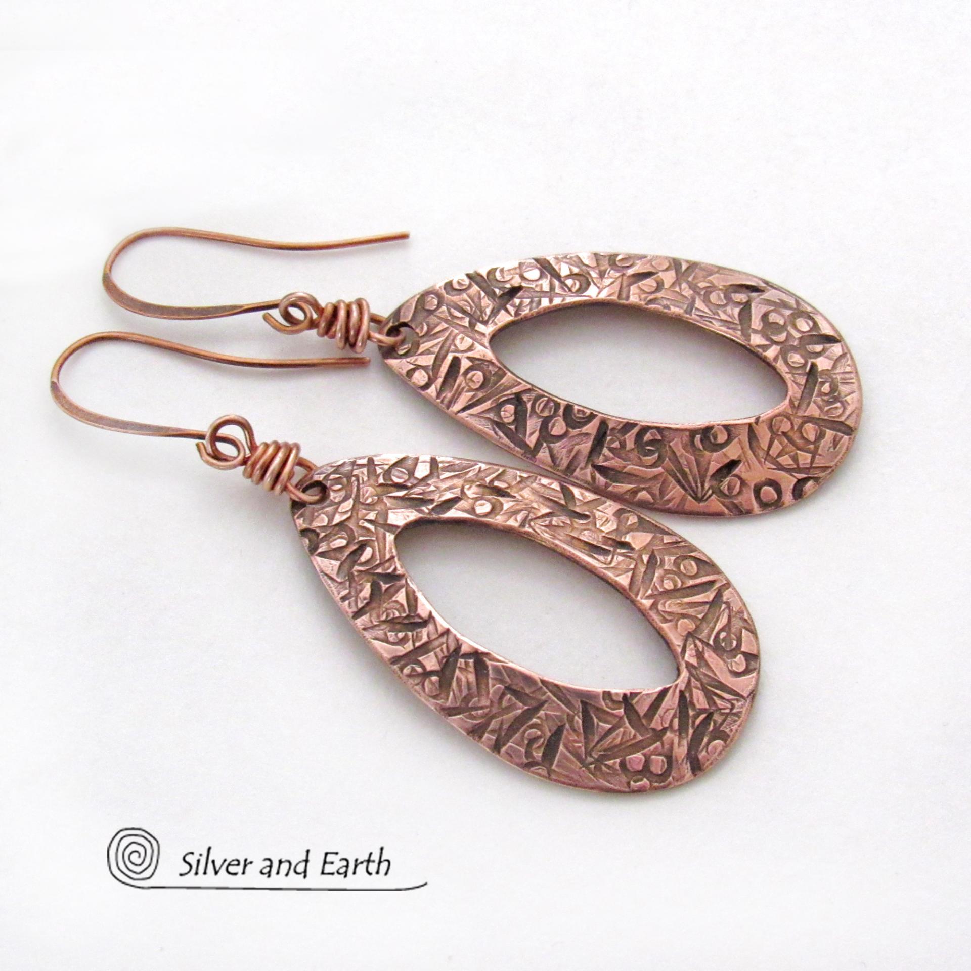 These handcrafted copper earrings have a modern, simplistic design that coordinates beautifully with all wardrobe styles. They have a hand stamped texture with an oxidized finish. They'll make a great 7th wedding anniversary gift - copper is the traditional metal for this occasion.