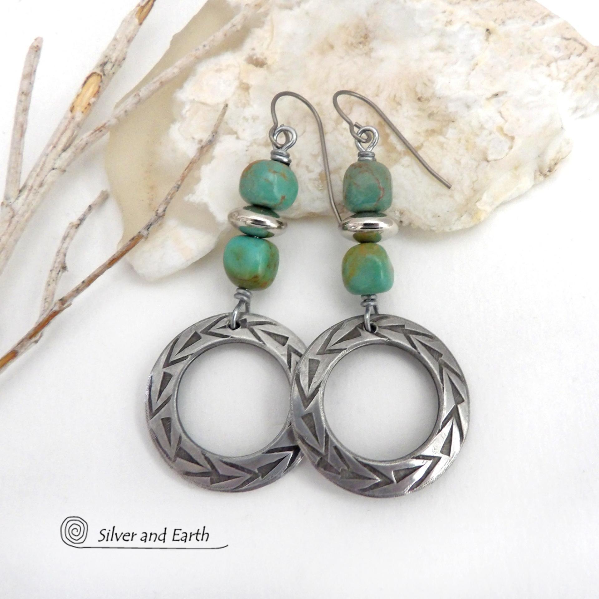These handcrafted earrings feature silver pewter hoops with a hand stamped texture accented with natural, genuine turquoise stones and silver plated beads. Lightweight and comfortable to wear, they have an earthy modern style with southwest flair that coordinates beautifully with all wardrobe types. Handmade in the USA by Silver and Earth Jewelry, a Certified New Mexico True business.