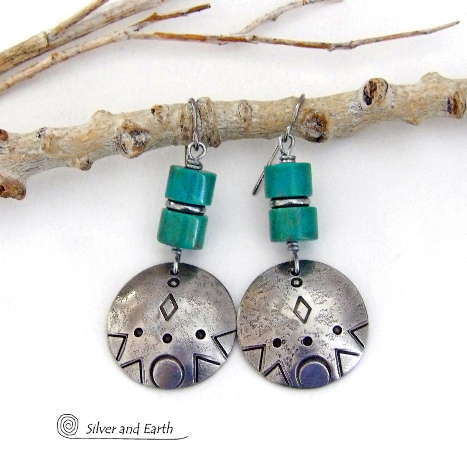These handcrafted earrings feature silver pewter dangles with a hand stamped texture accented with natural turquoise stones and stainless steel spacer beads. They have a bold modern style with southwestern flair and will make a unique striking statement. They'll make a great gift for anyone that loves turquoise stones and southwest style jewelry. Handmade in the USA by Silver and Earth Jewelry.