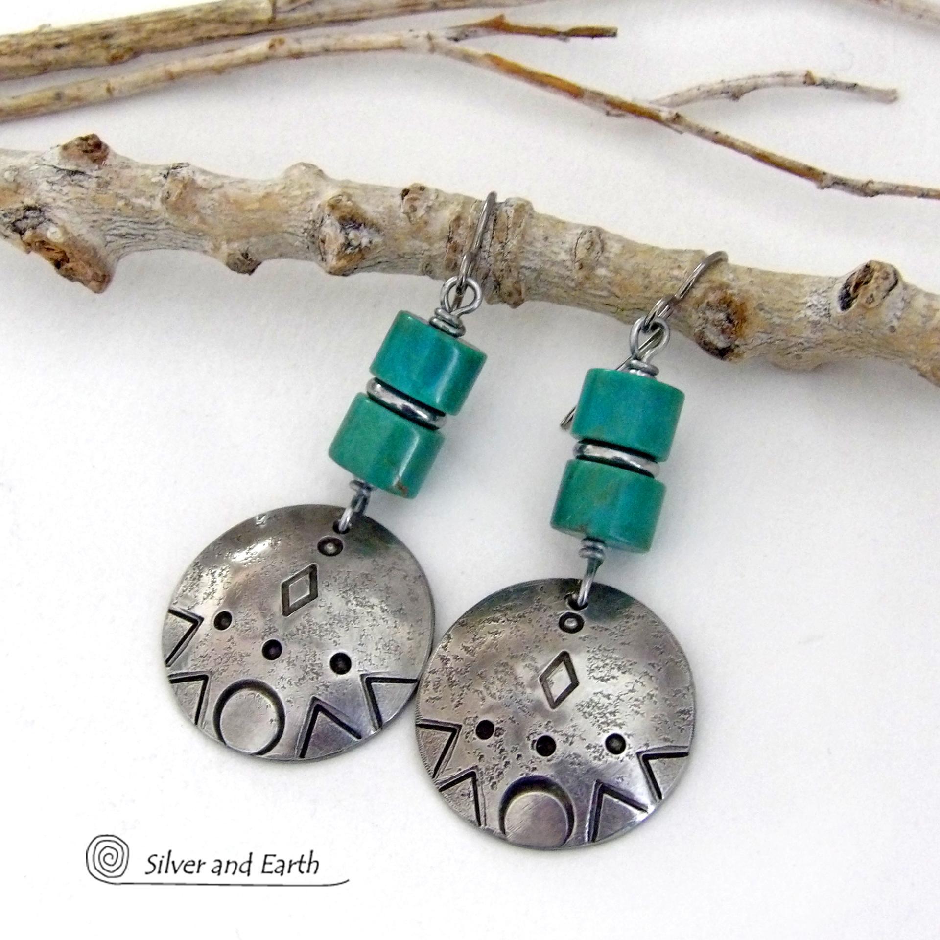 These handcrafted earrings feature silver pewter dangles with a hand stamped texture accented with natural turquoise stones and stainless steel spacer beads. They have a bold modern style with southwestern flair and will make a unique striking statement. They'll make a great gift for anyone that loves turquoise stones and southwest style jewelry. Handmade in the USA by Silver and Earth Jewelry.